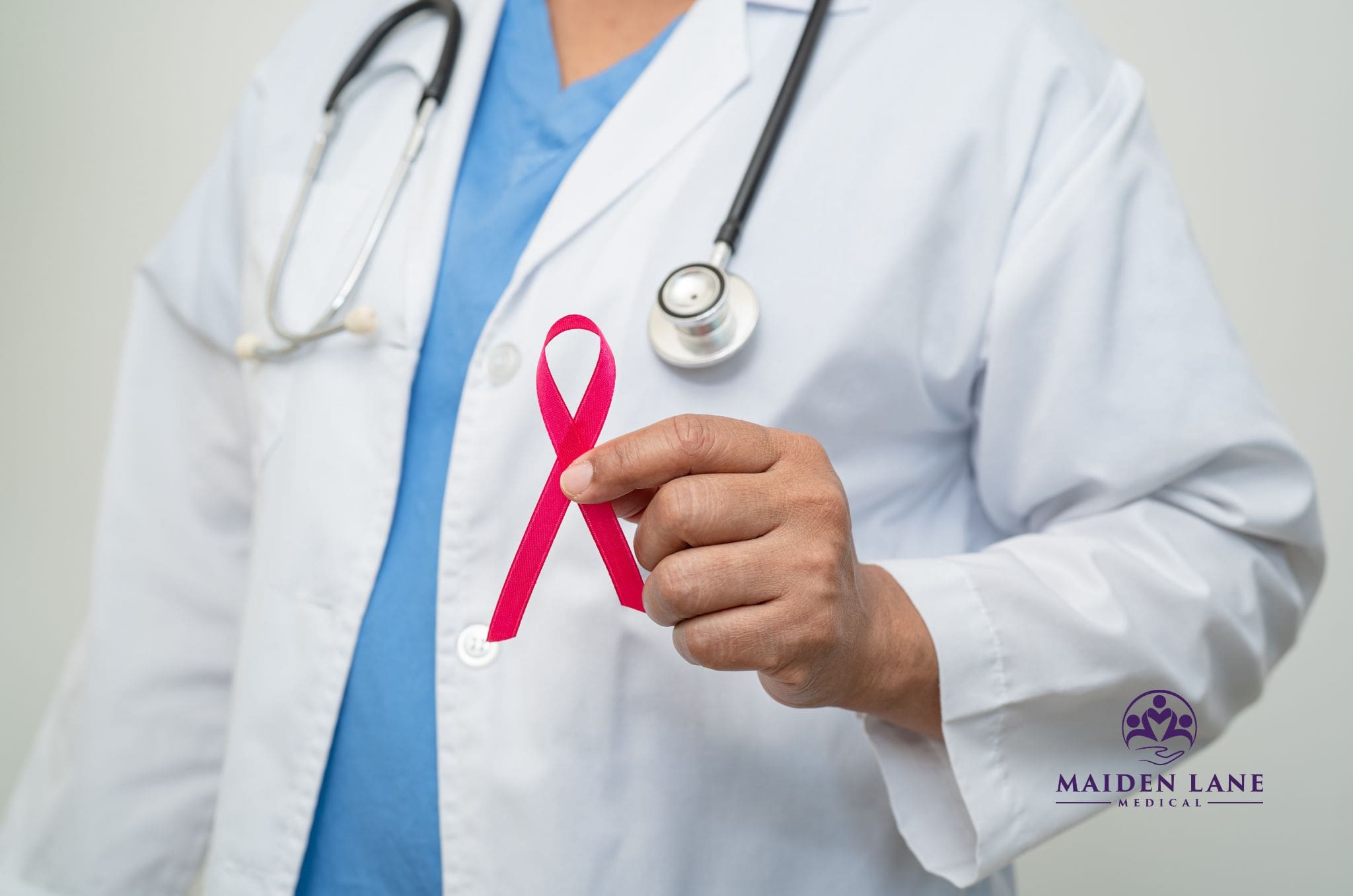 A doctor at Maiden Lane Medical discussing the benefits of annual breast cancer screenings.