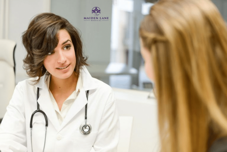 A woman talking to her gynecologist in Manhattan, New York.