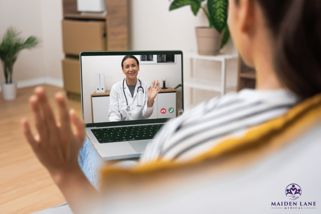 A woman having a virtual consultation from home to discuss her health concerns in New York.